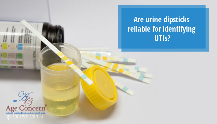 Are urine dipsticks reliable for identifying UTIs? Image of urine testing strips alongside urine sample.